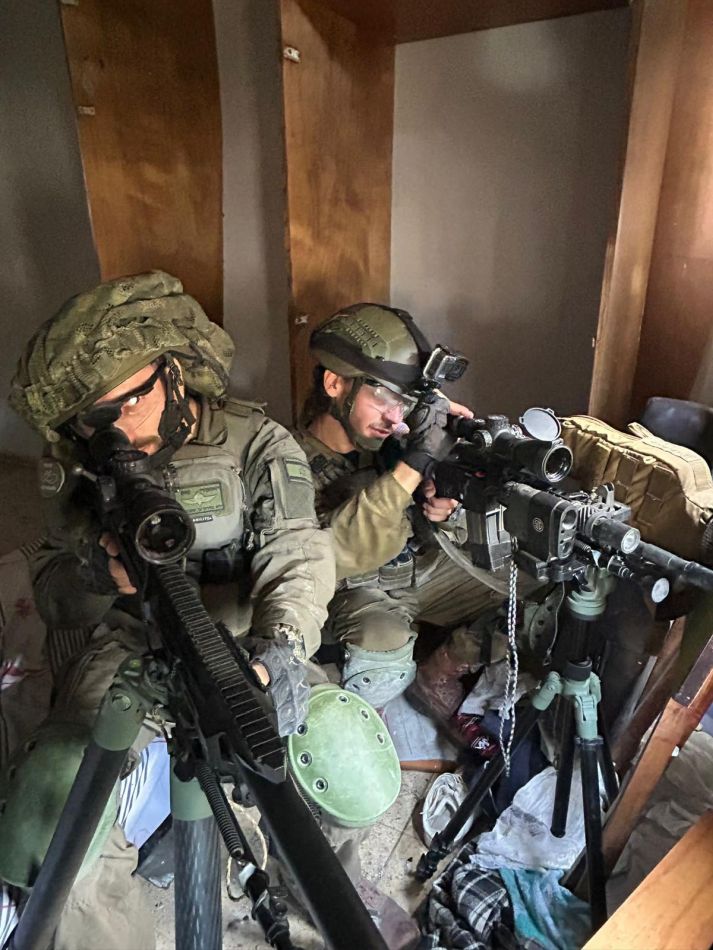 רגע לפני הכניסה לעזה, הלוחמים מתאמנים בבת ים