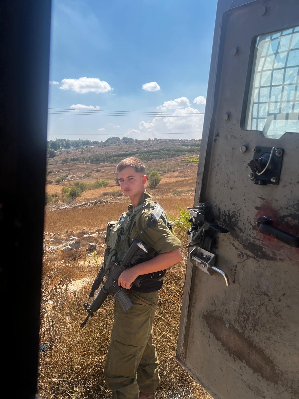 כ